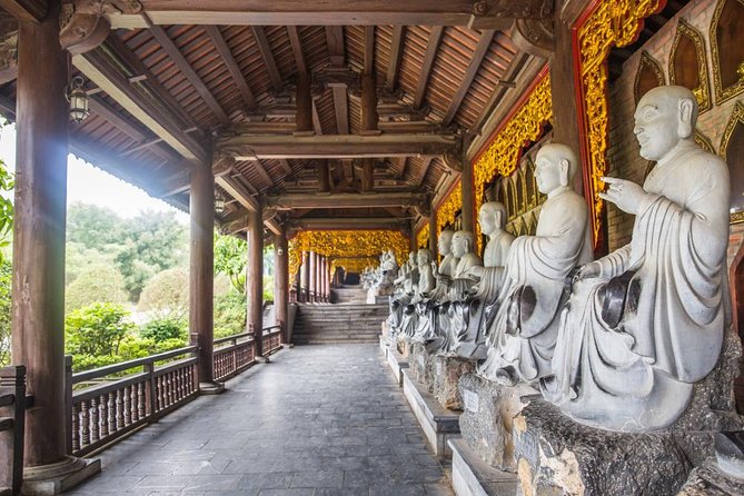 Bai Dinh Pagoda, Trang An boat and Mua Cave Limousine from Hanoi - Trang An by boat, through caves and limestone peaks
