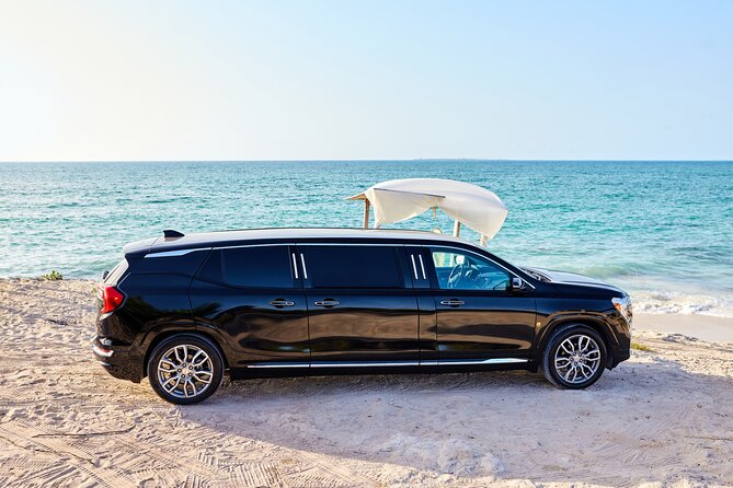 Deluxe GMC Limousine from CUN Airport to Playa Mujeres - Drinks, coffee, Wi-Fi, and the limousine setup
