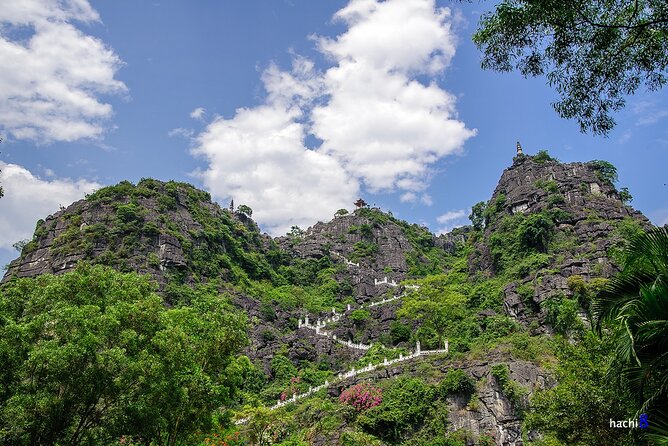 Deluxe & Small Group Hoa Lu Tam Coc Mua Cave Full Day Tour - Limousine Transfer - Leaving Hanoi in a limousine