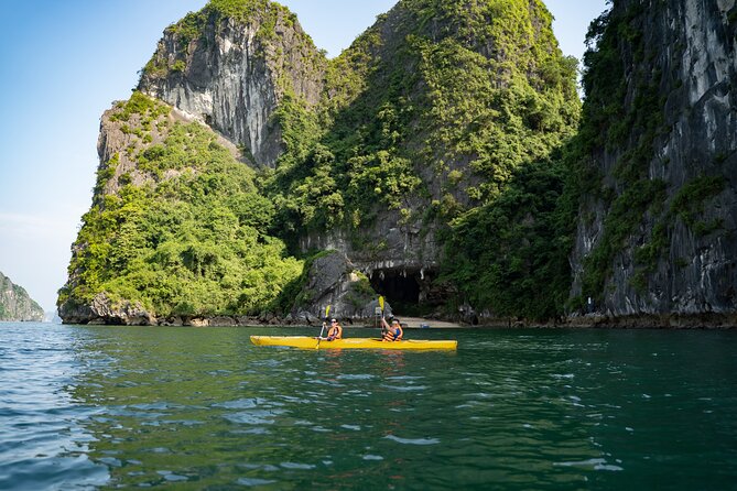 From Hanoi: 2D1N Ha Long Bay Deluxe Cruise with Bus Limousine - Sunset, dinner and evening activities on board