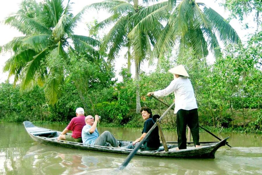 From Ho Chi Minh City: Mekong Delta VIP Tour by Limousine - Coconut candy and orchard paths