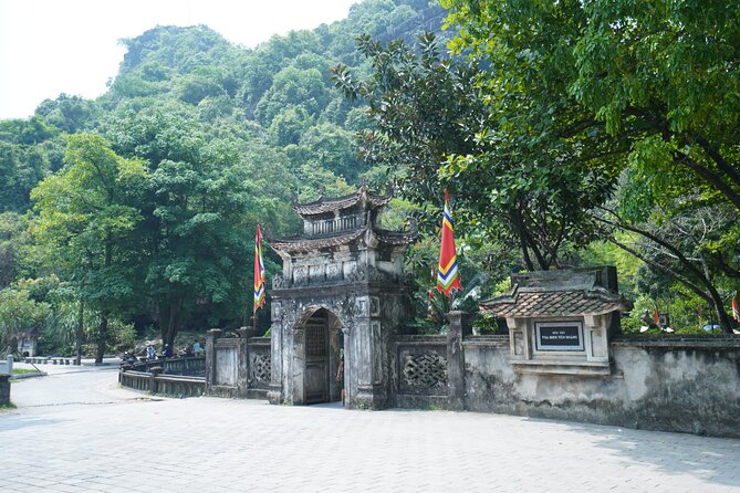 Full Day Hoa Lu/Tam Coc/ Mua Cave Tour by Limousine Bus - Leaving Hanoi in a limousine bus