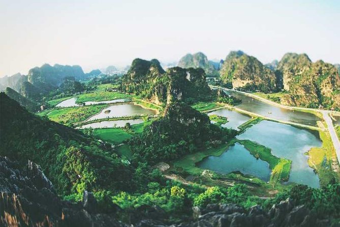 Hanoi - Hoa Lu - Tam Coc - Mua Cave - 1 Day Tour. By Luxury Limousine From Hanoi - Tam Coc by boat, through three caves