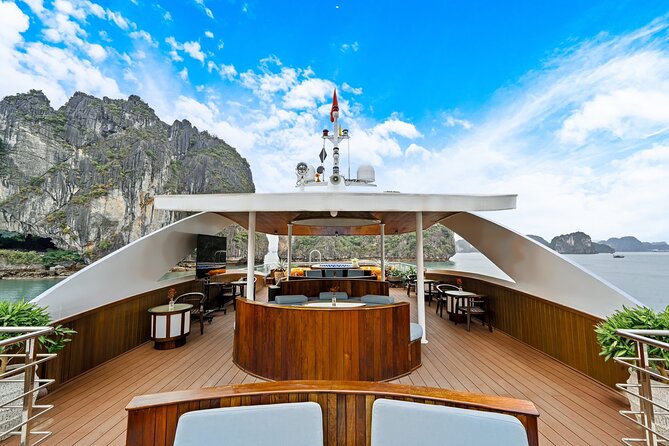 Hanoi to Ha Long Symphony Cruise with Limousine and Local Lunch - Titop Island and its small beach