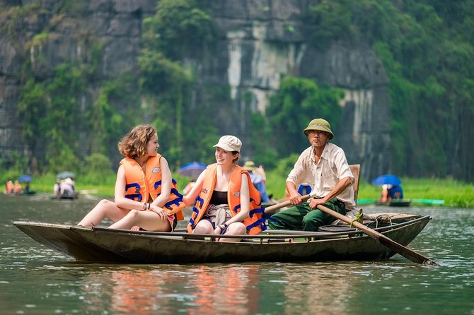 Hoa Lu - Tam Coc Luxury Small group 1D: Limousine bus, biking, boat trip, Lunch - Tam Coc by bamboo sampan