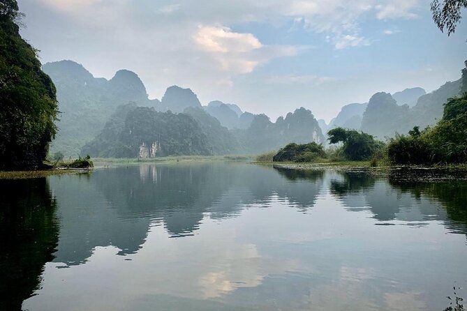 Hoa Lu - Tam Coc - Mua Cave Full Day - LIMOUSINE - Forty-five minutes by bicycle to Bich Dong Pagoda