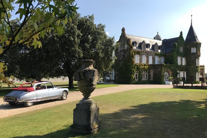 Médoc luxury wine tour aboard a Citroën DS Limousine Convertible - Château Beychevelle and the castle road
