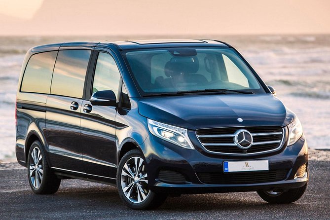 VIP Limo Transfers From & To Santorini Airport - Arriving at Santorini Airport with a name sign